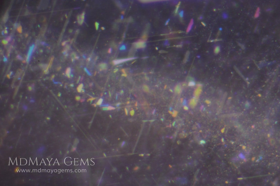 Inclusions in natural and untreated Color Change Sapphire 4.03 ctt