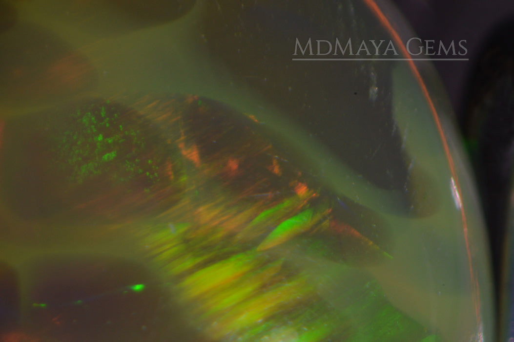 Top Brilliant honeycomb pattern Welo Ethiopian Opal. 1.09 ct under microscope