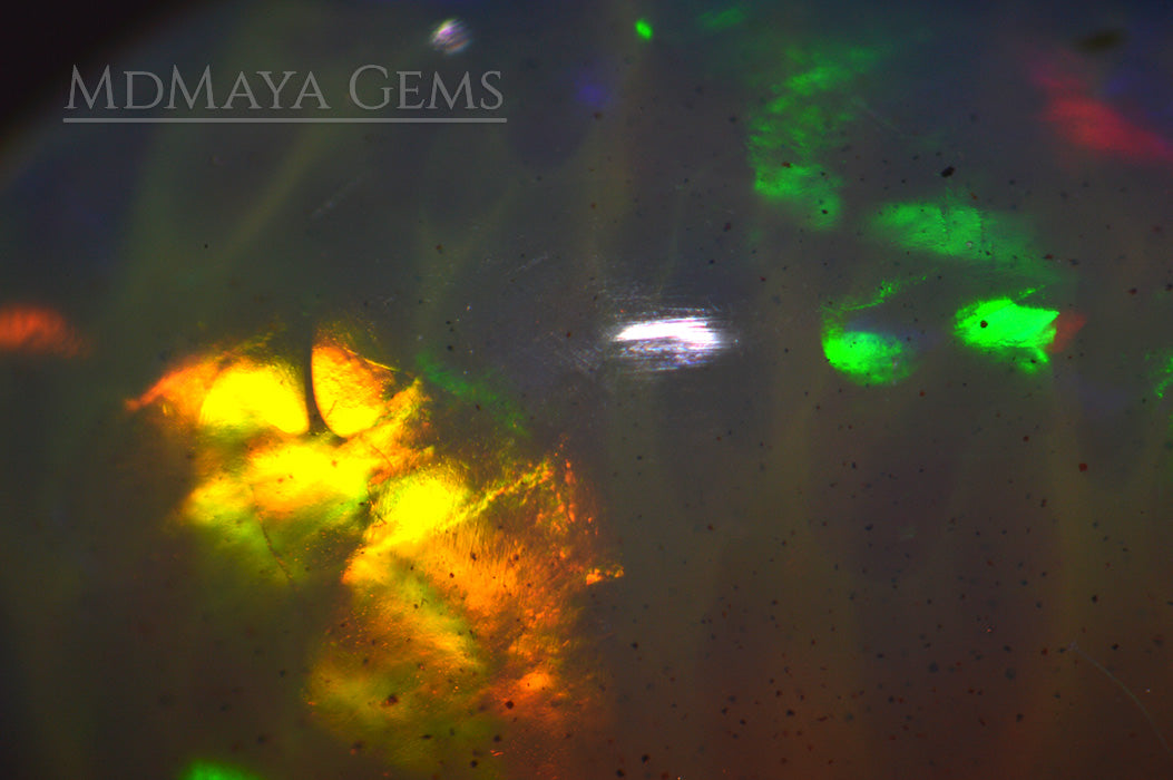 Marvellous Welo Opal 1.10 ct under microscope