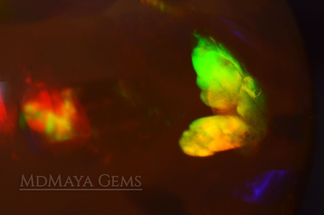 Rare and Stunning Welo Opal 2.49 ct with a honeycomb patter under microscope