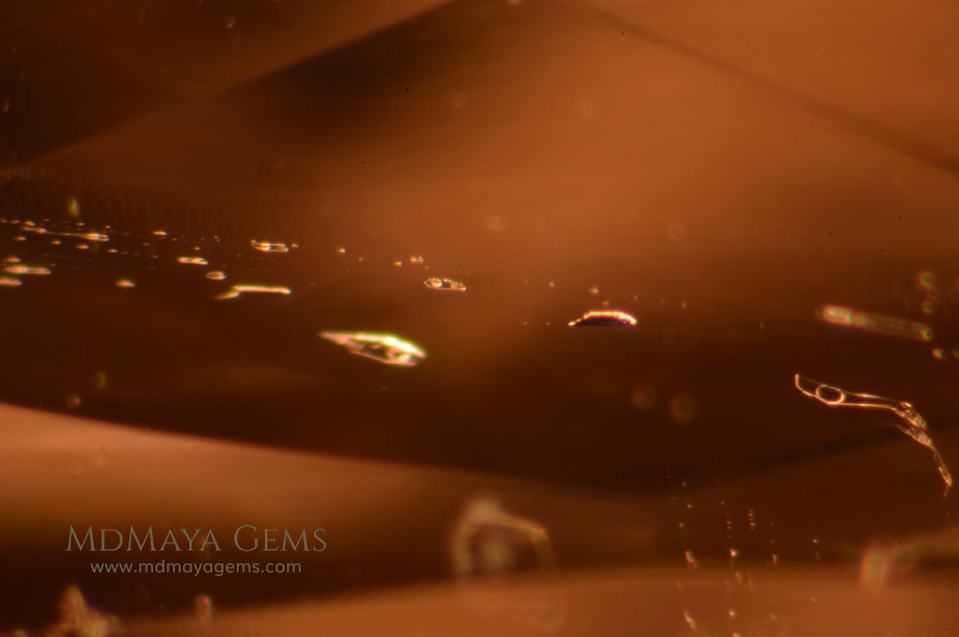 Inclusions in Orange Peach Topaz Gem 15.70 ct Cushion Cut