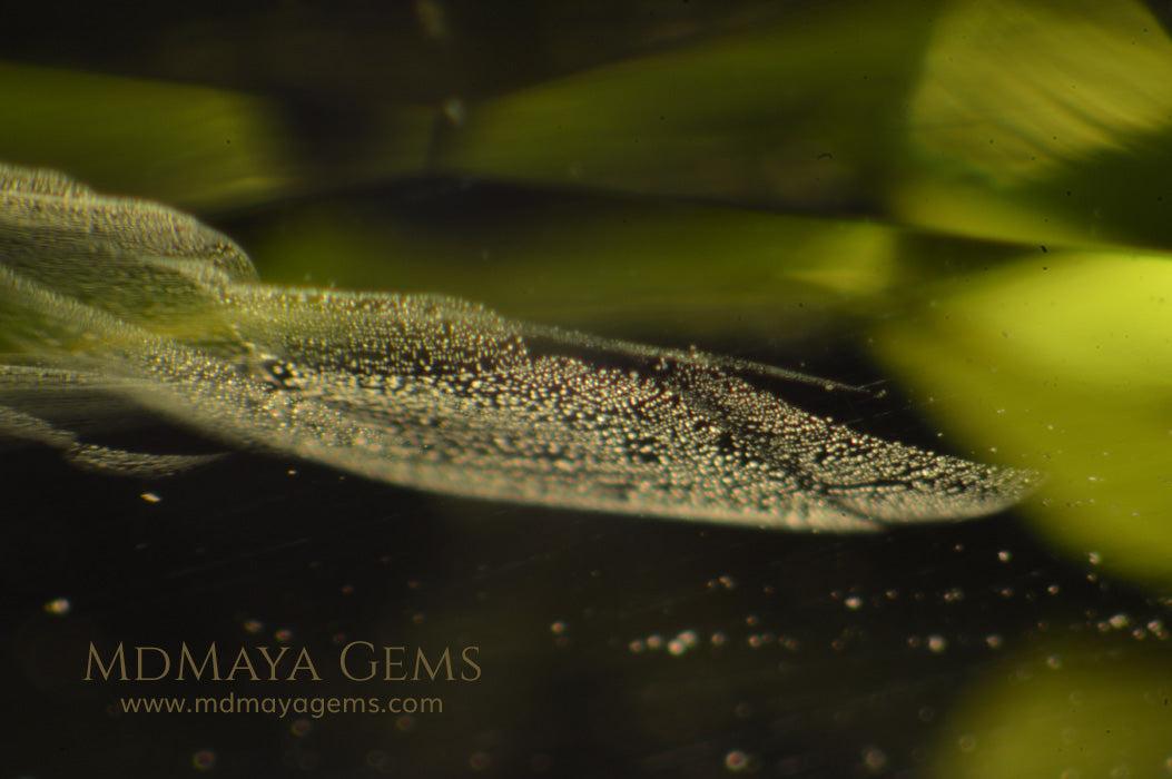 Inclusions in Green Peridot Cushion Cut 4.72 ct