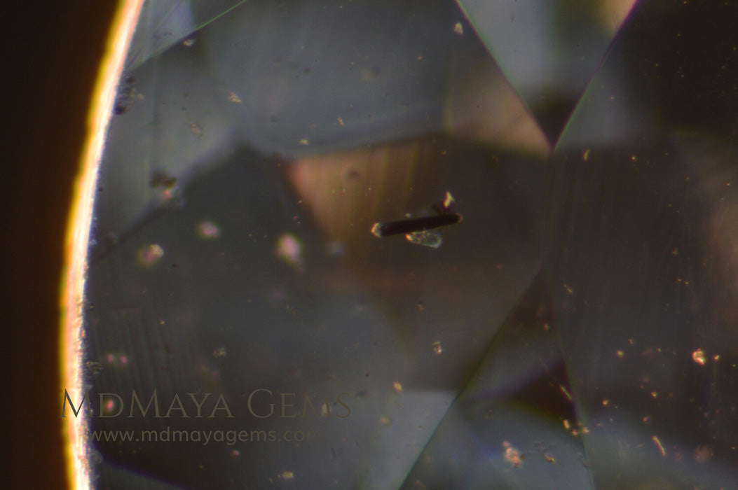 Solid Inclusions in blue Aquamarine Oval cut 1.33 ct