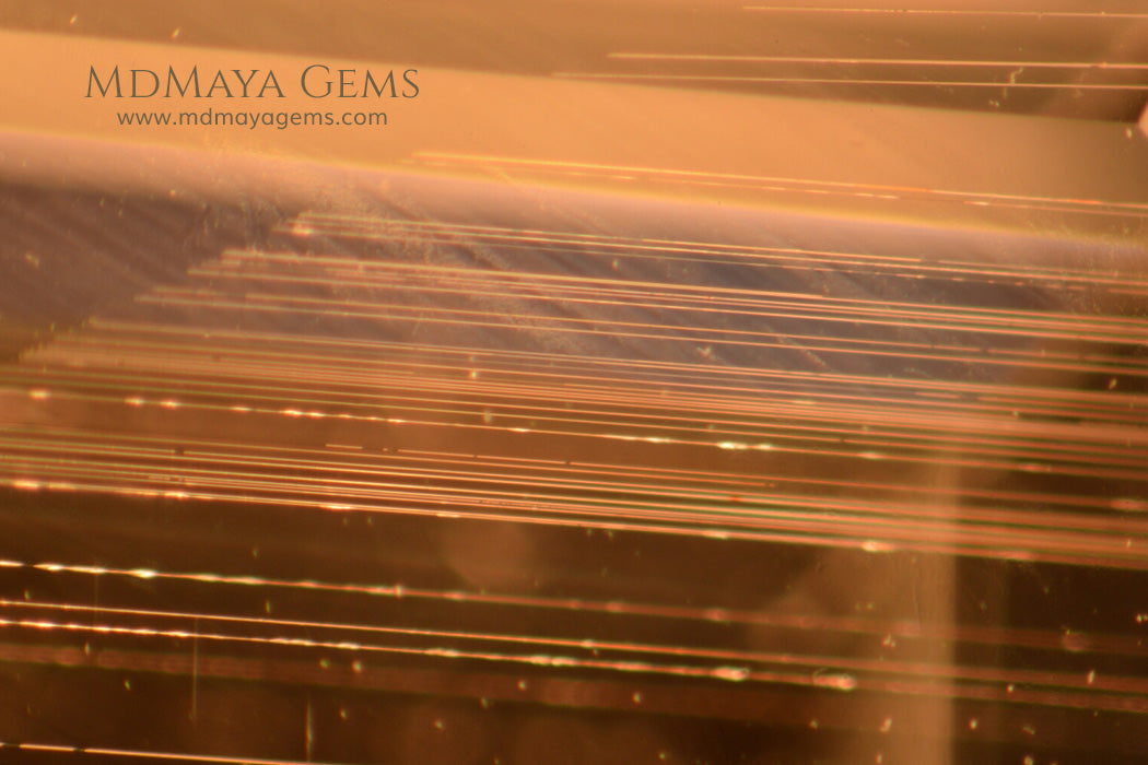 Inclusions in very Light Blue Aquamarine 19.63 ct Emerald cut