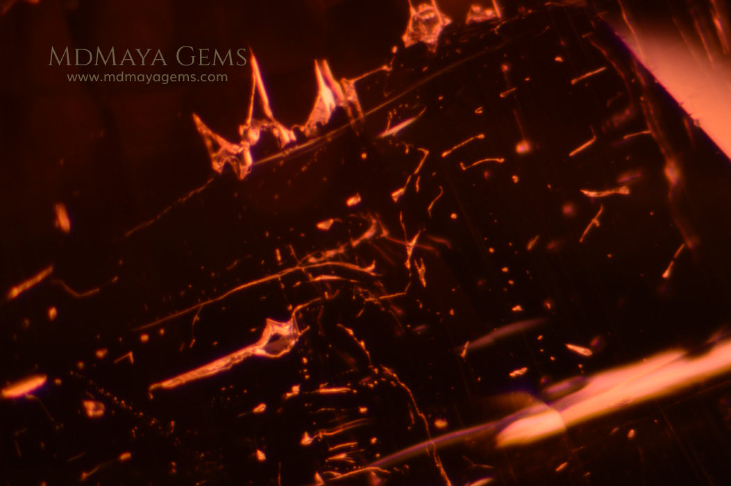 Inclusions in untreated Rubellite. Oval Cut. 4.04 ct