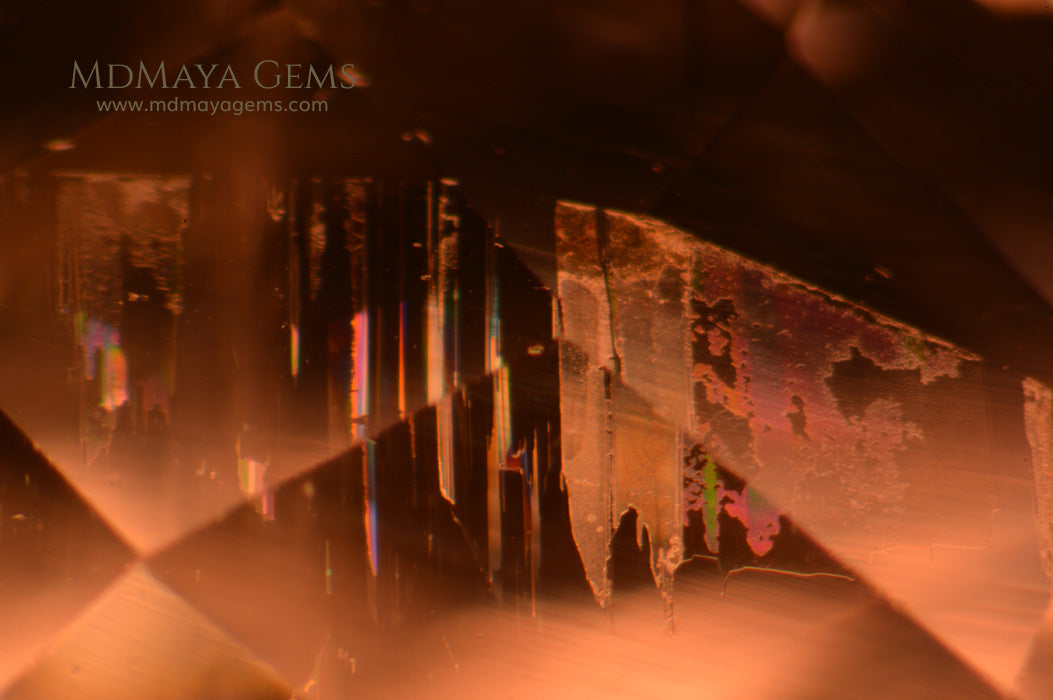 Two-Phase Inclusions in Natural Pink Kunzite 6.11 ct (under microscope)