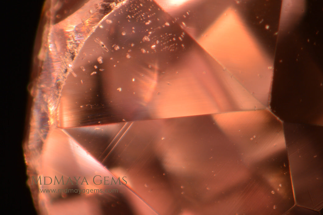 Light Pink Kunzite Stone 7.83 ct under microscope, two-phase inclusions