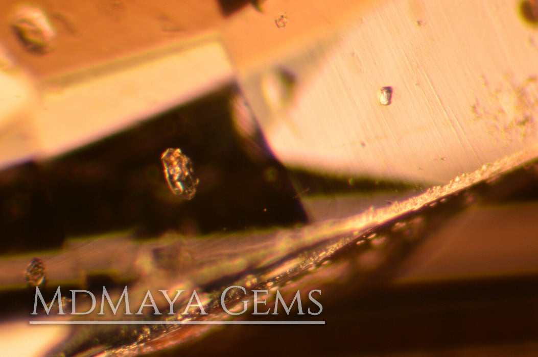 Inclusions in Blue Africana Aquamarine. 10 pieces. Pear cut. 3.86 ct total.