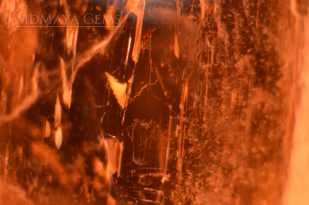 Inclusions in Natural Golden Imperial Topaz. 3.83 carat