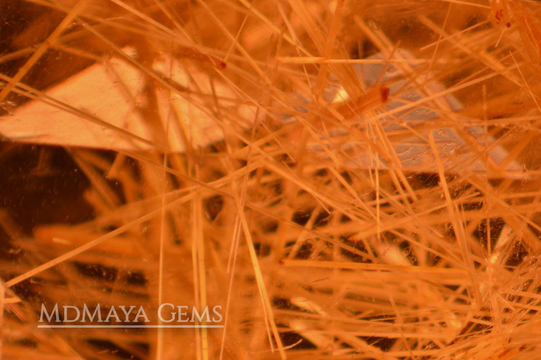 Inclusions in golden rutilated quartz