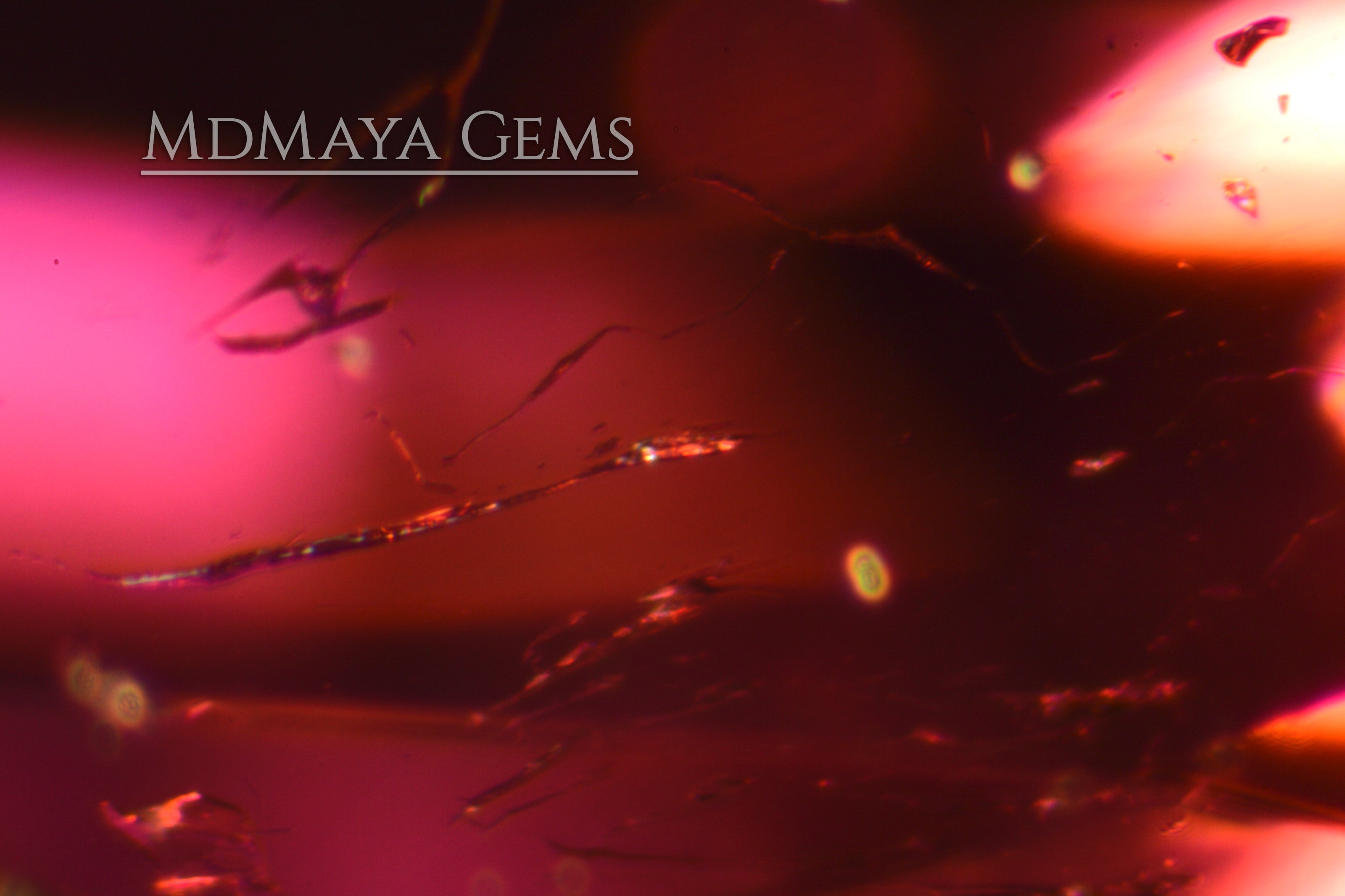 Interconnected two-phase inclusions in Brilliant Rich Purple Red Rubellite Tourmaline from Mozambique Oval Cut 5.02 ct.