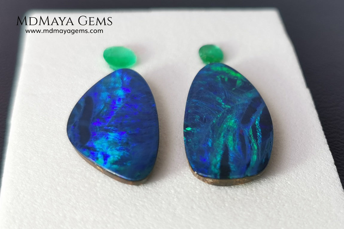 Opal Doublets and Emeralds. This set is composed by a pair of bright Australian Opal doublet and two vivid Zambian Emeralds. The perfect combination for your bespoke jewelry.
