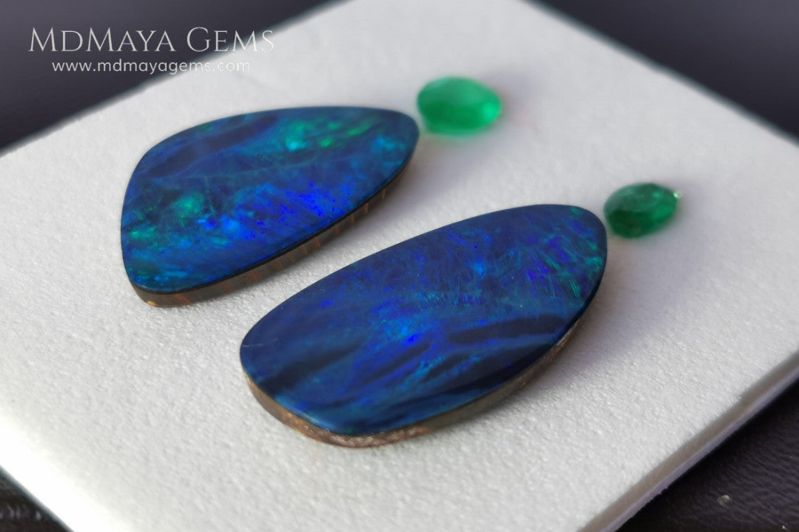  Opal Doublets and Emeralds. This set is composed by a pair of bright Australian Opal doublet and two vivid Zambian Emeralds. The perfect combination for your bespoke jewelry.