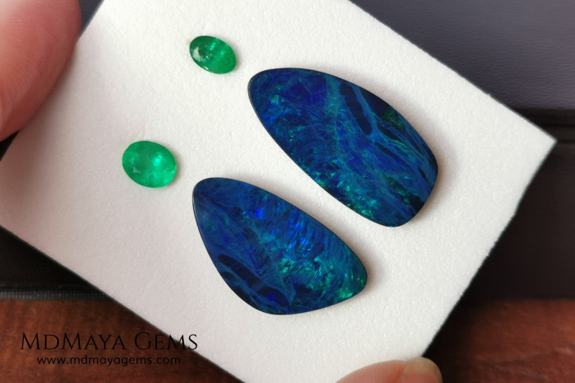 Opal Doublets and Emeralds. This set is composed by a pair of bright Australian Opal doublet and two vivid Zambian Emeralds. The perfect combination for your bespoke jewelry.