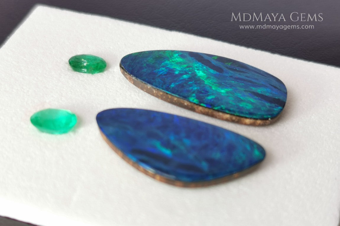  Opal Doublets and Emeralds. This set is composed by a pair of bright Australian Opal doublet and two vivid Zambian Emeralds. The perfect combination for your bespoke jewelry.