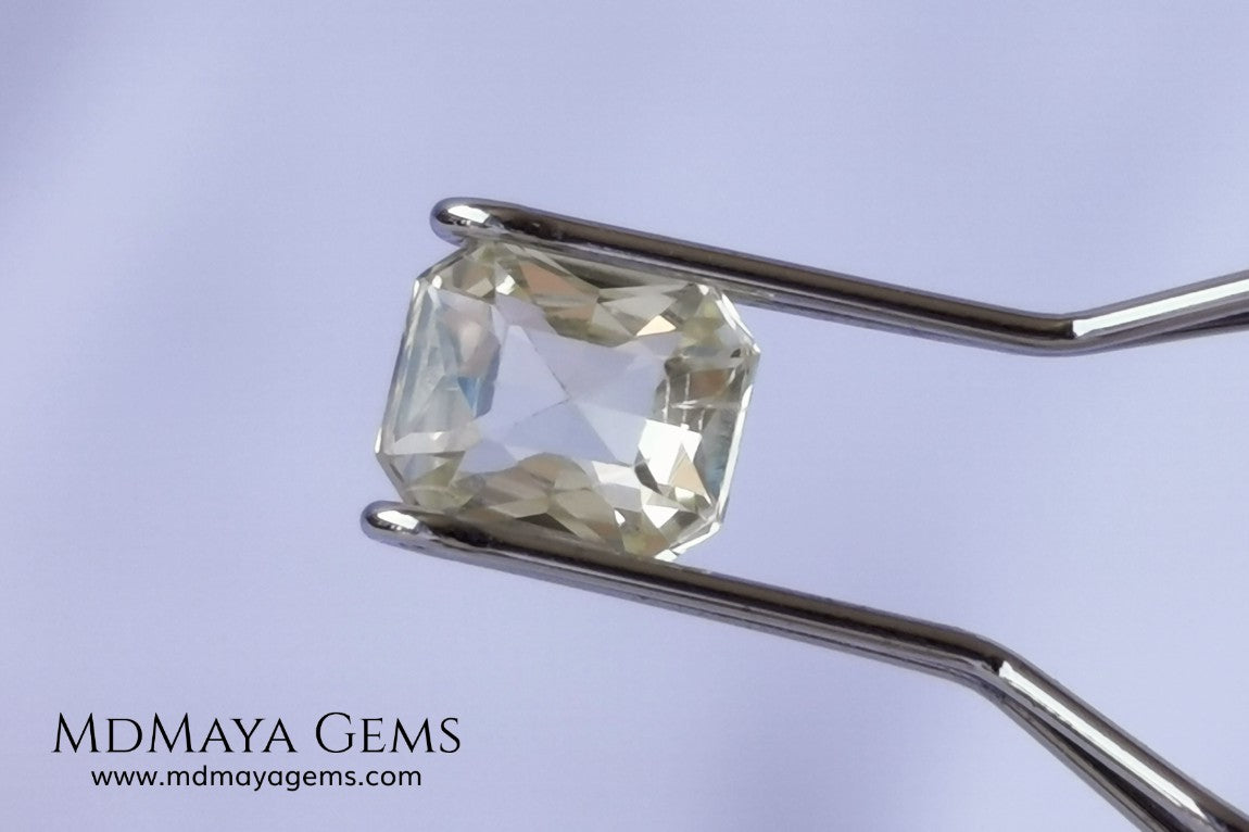  Light Yellow Sapphire. Radiant Cut. 0.92 ct. This elegant gemstone shows a delicate bright pale yellow, its quality of cut is very good. It will impressive in an engagement ring or something special, the best, its price. Don't miss it!