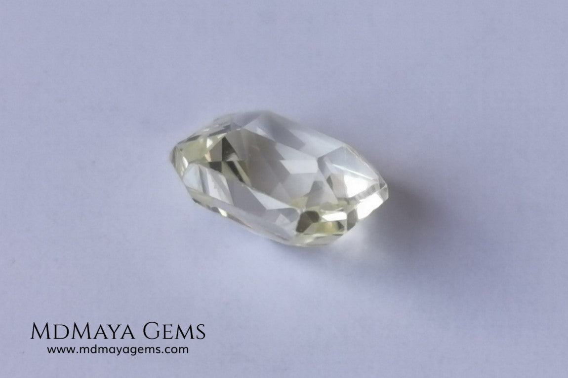  Light Yellow Sapphire. Radiant Cut. 0.92 ct. This elegant gemstone shows a delicate bright pale yellow, its quality of cut is very good. It will impressive in an engagement ring or something special, the best, its price. Don't miss it!