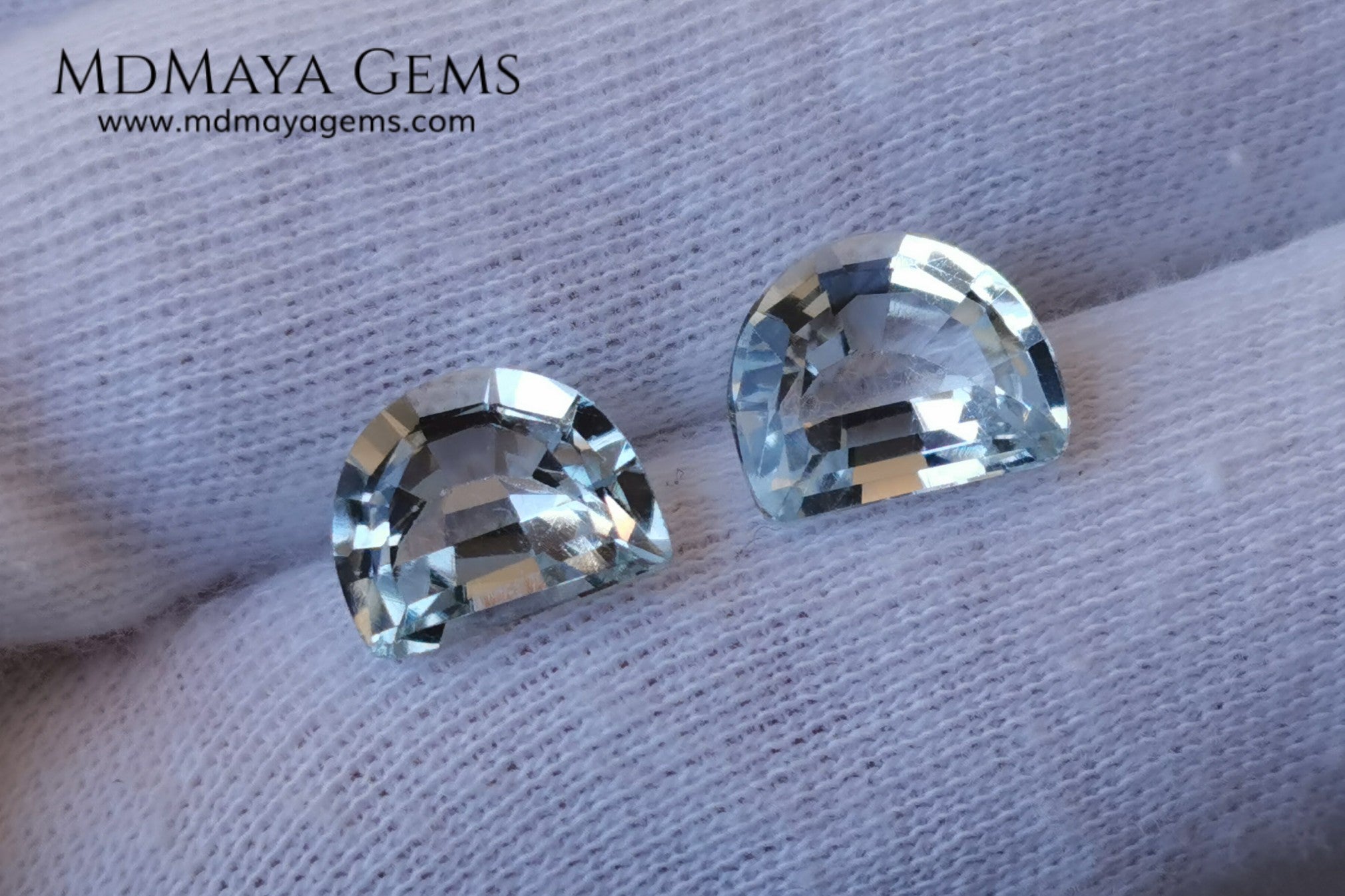 Beautiful pair of very light blue topazes. 6.50 ct