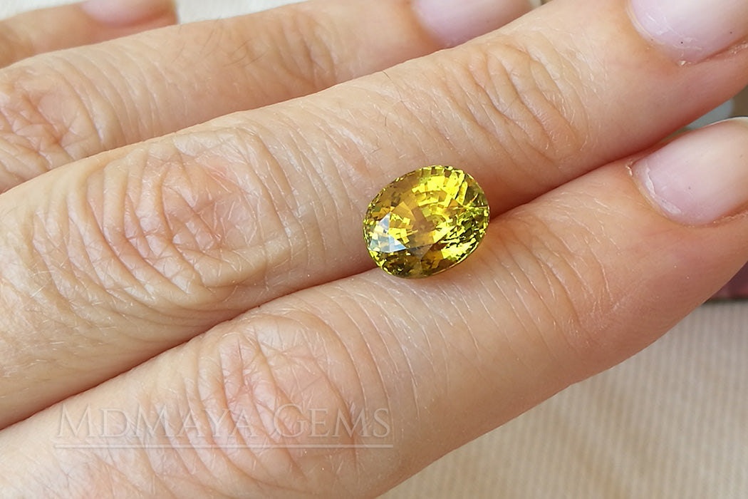 Sparkle Vivid Greenish Yellow Mali Garnet Oval Cut 4.54 ct