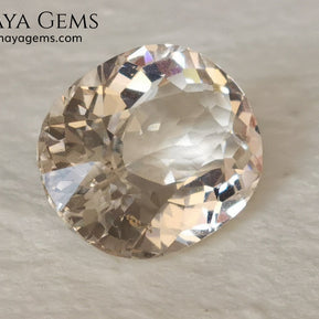 Light Peach Morganite. Oval Cut. 11.98 ct.  This morganite has a very light pale peach color, it is a natural gem of large size, beautiful proportions and great brilliance, it has a small fracture in the pavilion, but that does not affect the beauty of the gem. Once mounted on any piece of jewelry it will be spectacular and the best price. A great gem within the reach of any pocket.