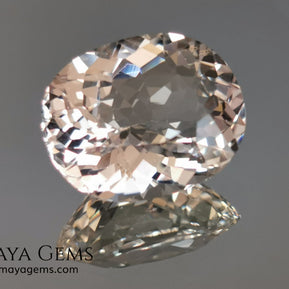 Light Peach Morganite. Oval Cut. 11.98 ct.  This morganite has a very light pale peach color, it is a natural gem of large size, beautiful proportions and great brilliance, it has a small fracture in the pavilion, but that does not affect the beauty of the gem. Once mounted on any piece of jewelry it will be spectacular and the best price. A great gem within the reach of any pocket.