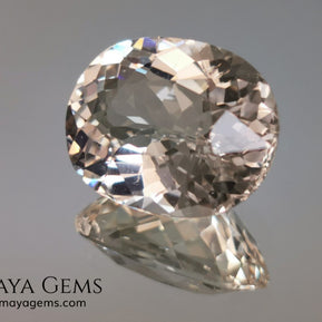 Light Peach Morganite. Oval Cut. 11.98 ct.  This morganite has a very light pale peach color, it is a natural gem of large size, beautiful proportions and great brilliance, it has a small fracture in the pavilion, but that does not affect the beauty of the gem. Once mounted on any piece of jewelry it will be spectacular and the best price. A great gem within the reach of any pocket.