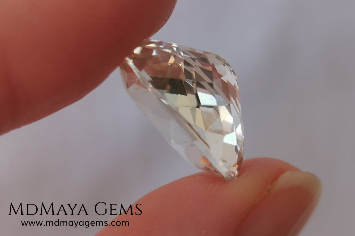 Light Peach Morganite. Oval Cut. 11.98 ct.  This morganite has a very light pale peach color, it is a natural gem of large size, beautiful proportions and great brilliance, it has a small fracture in the pavilion, but that does not affect the beauty of the gem. Once mounted on any piece of jewelry it will be spectacular and the best price. A great gem within the reach of any pocket.