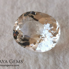 Light Peach Morganite. Oval Cut. 11.98 ct.  This morganite has a very light pale peach color, it is a natural gem of large size, beautiful proportions and great brilliance, it has a small fracture in the pavilion, but that does not affect the beauty of the gem. Once mounted on any piece of jewelry it will be spectacular and the best price. A great gem within the reach of any pocket.