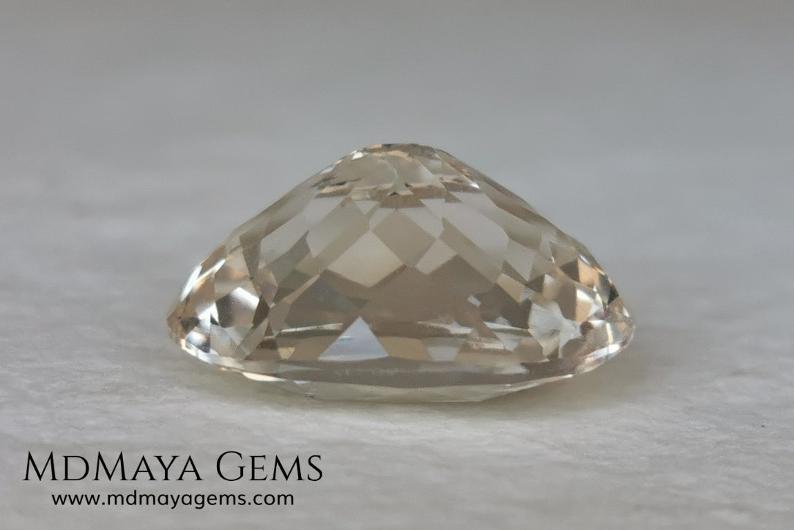 Light Peach Morganite. Oval Cut. 11.98 ct.  This morganite has a very light pale peach color, it is a natural gem of large size, beautiful proportions and great brilliance, it has a small fracture in the pavilion, but that does not affect the beauty of the gem. Once mounted on any piece of jewelry it will be spectacular and the best price. A great gem within the reach of any pocket.