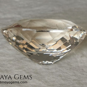 Light Peach Morganite. Oval Cut. 11.98 ct.  This morganite has a very light pale peach color, it is a natural gem of large size, beautiful proportions and great brilliance, it has a small fracture in the pavilion, but that does not affect the beauty of the gem. Once mounted on any piece of jewelry it will be spectacular and the best price. A great gem within the reach of any pocket.