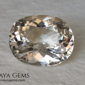 Light Peach Morganite. Oval Cut. 11.98 ct.  This morganite has a very light pale peach color, it is a natural gem of large size, beautiful proportions and great brilliance, it has a small fracture in the pavilion, but that does not affect the beauty of the gem. Once mounted on any piece of jewelry it will be spectacular and the best price. A great gem within the reach of any pocket.