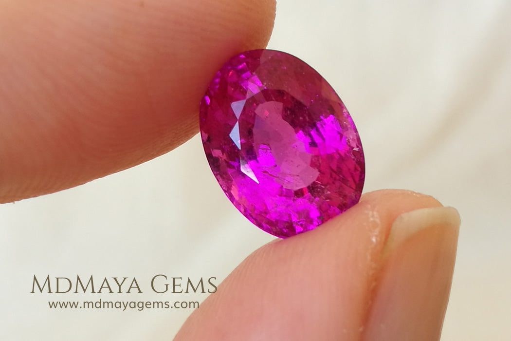 Neon Pink Rubellite Tourmaline from Mozambique Oval Cut 4.14 ct under daylight