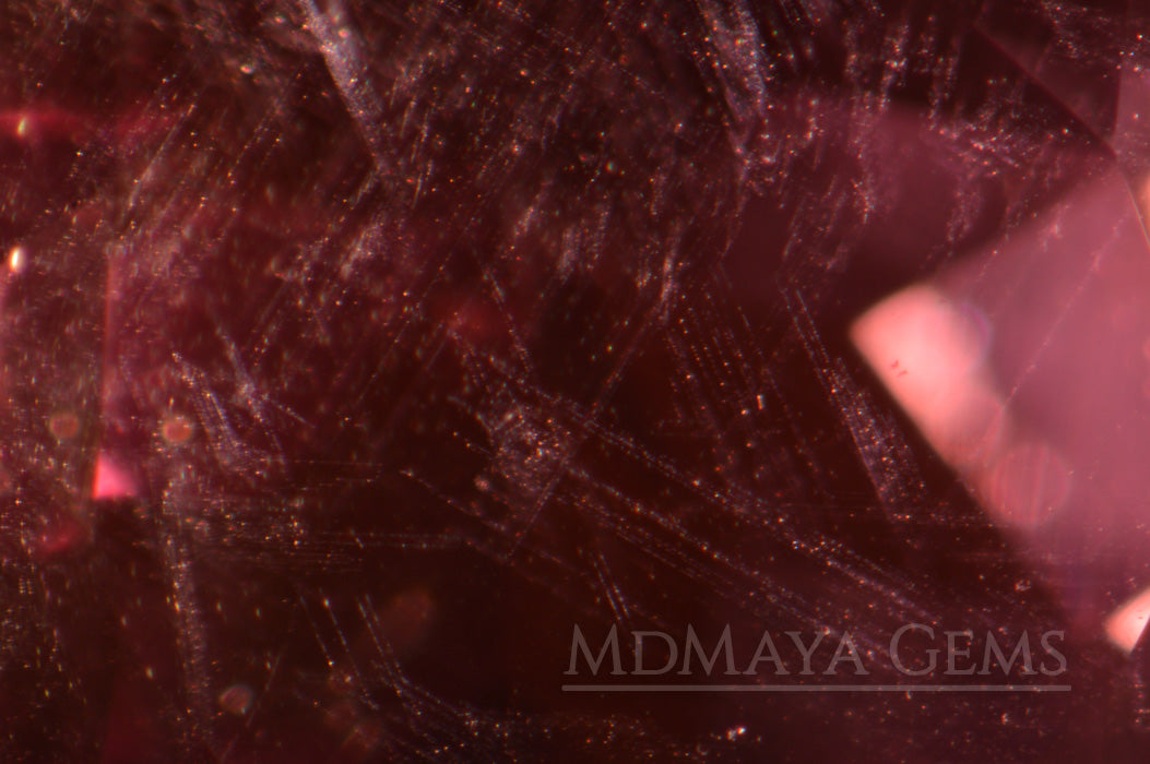 Inclusions in Natural Purple Spinel from Sri Lanka. Octagon Cut. 1.85 ct.