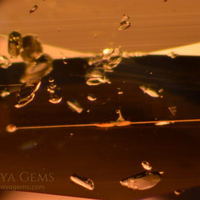 Inclusions in bicolour tourmaline 2.33 ct