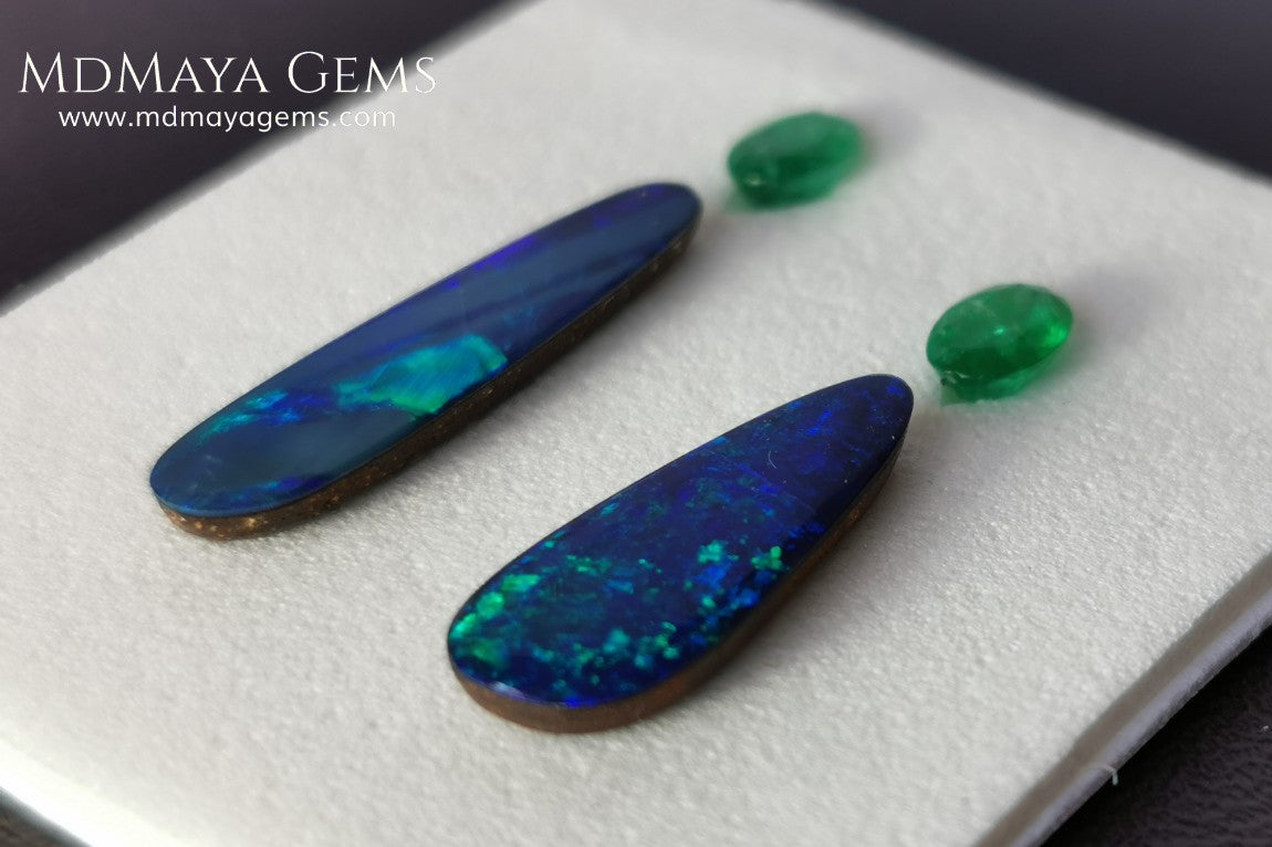  Opal Doublets and Emeralds. This set is composed by a pair of bright Australian Opal doublet and two vivid Zambian Emeralds. The perfect combination for your bespoke jewelry. 