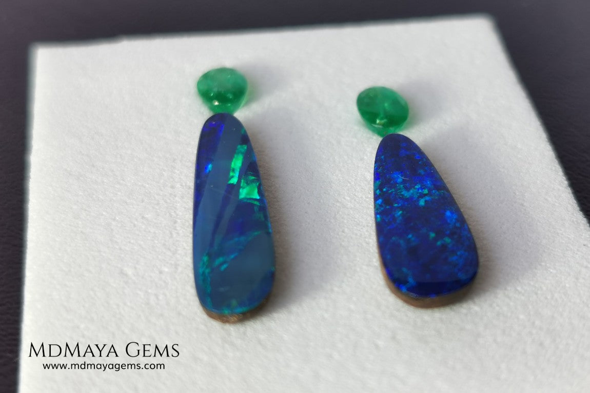  Opal Doublets and Emeralds. This set is composed by a pair of bright Australian Opal doublet and two vivid Zambian Emeralds. The perfect combination for your bespoke jewelry. 