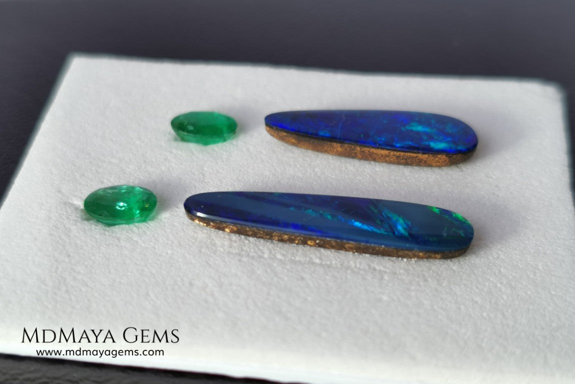  Opal Doublets and Emeralds. This set is composed by a pair of bright Australian Opal doublet and two vivid Zambian Emeralds. The perfect combination for your bespoke jewelry. 