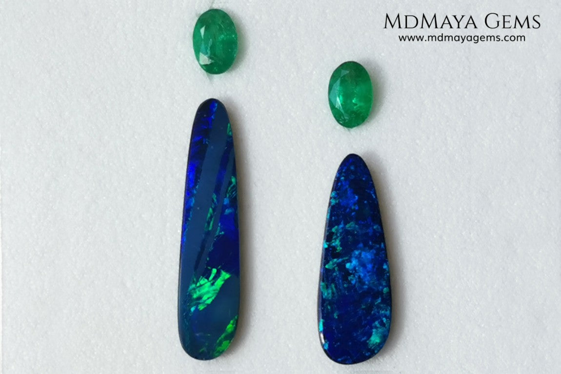  Opal Doublets and Emeralds. This set is composed by a pair of bright Australian Opal doublet and two vivid Zambian Emeralds. The perfect combination for your bespoke jewelry. 