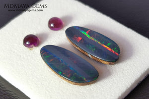 Opal Doublets and Umbalite Garnets. This set is composed by a pair of bright Australian Opal doublet and two vivid Umbalites. The perfect combination for your bespoke jewelry.