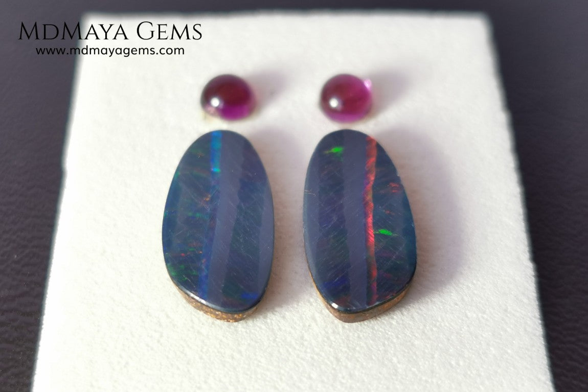 Opal Doublets and Umbalite Garnets. This set is composed by a pair of bright Australian Opal doublet and two vivid Umbalites. The perfect combination for your bespoke jewelry.