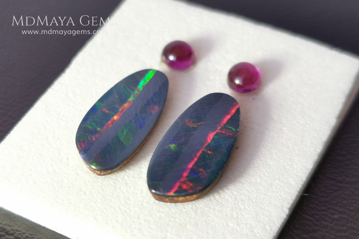 Opal Doublets and Umbalite Garnets. This set is composed by a pair of bright Australian Opal doublet and two vivid Umbalites. The perfect combination for your bespoke jewelry.
