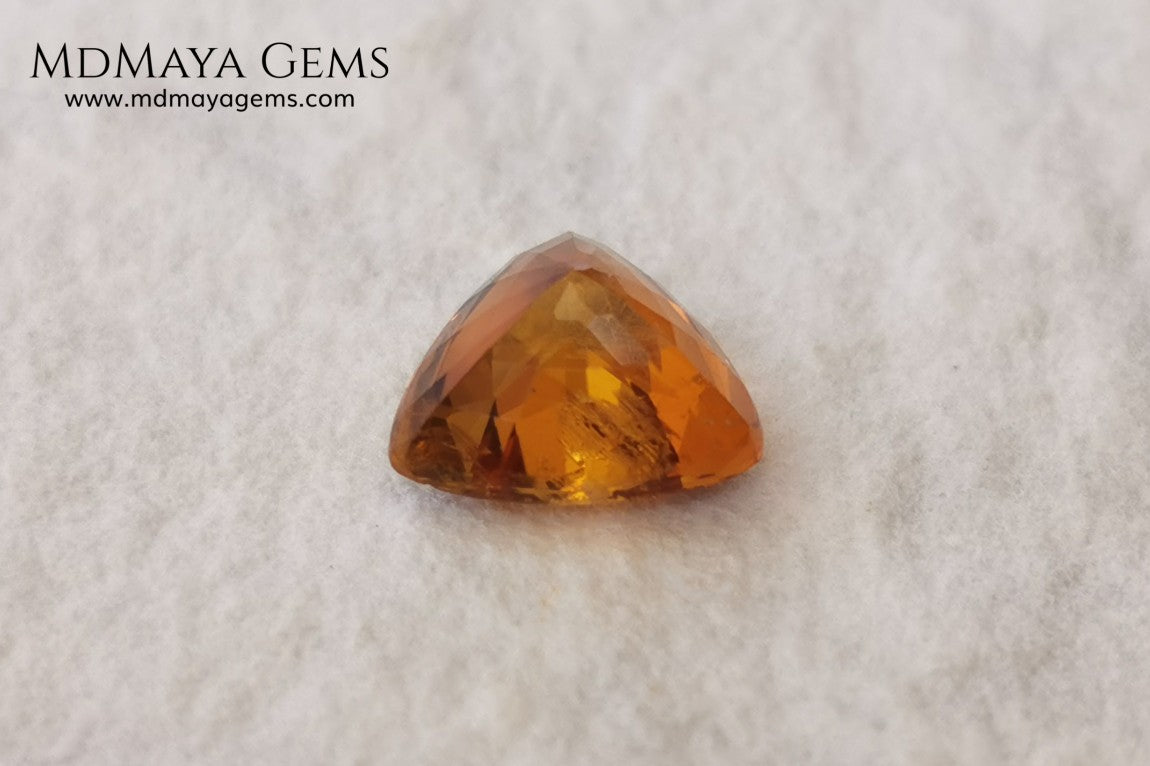 Natural Orange Tourmaline from Tanzania. 1.35 ct. Trillion cut. Rare gemstone with a beautiful honey color. It will look perfect in any piece of jewelry. 