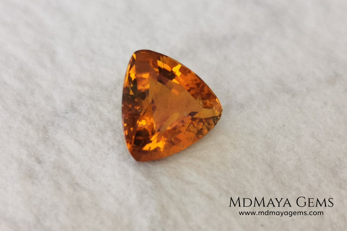 Natural Orange Tourmaline from Tanzania. 1.35 ct. Trillion cut. Rare gemstone with a beautiful honey color. It will look perfect in any piece of jewelry. 