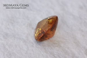 Natural Orange Tourmaline from Tanzania. 1.35 ct. Trillion cut. Rare gemstone with a beautiful honey color. It will look perfect in any piece of jewelry. 
