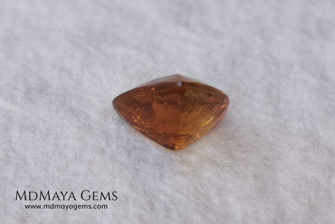 Natural Orange Tourmaline from Tanzania. 1.35 ct. Trillion cut. Rare gemstone with a beautiful honey color. It will look perfect in any piece of jewelry. 