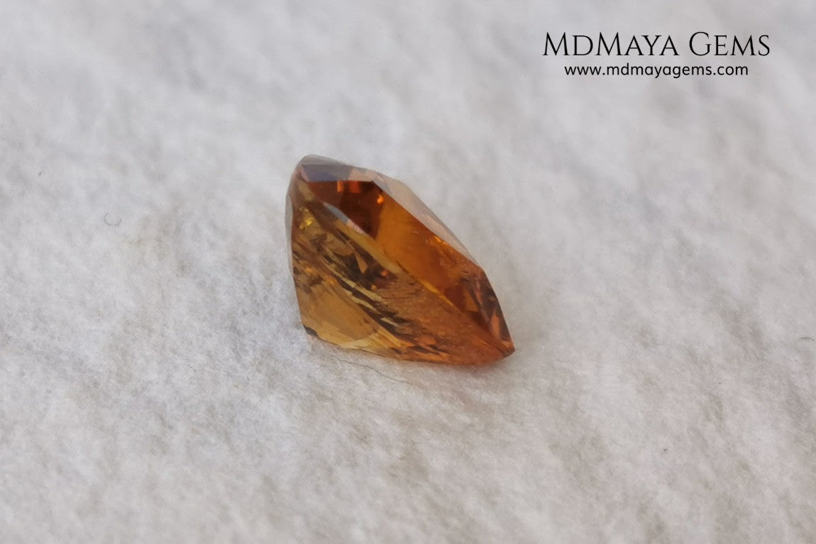 Natural Orange Tourmaline from Tanzania. 1.35 ct. Trillion cut. Rare gemstone with a beautiful honey color. It will look perfect in any piece of jewelry. 