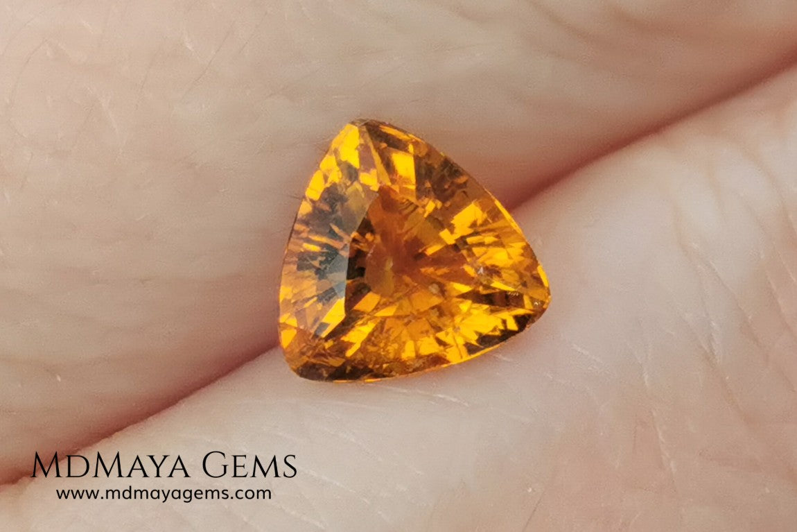 Natural Orange Tourmaline from Tanzania. 1.35 ct. Trillion cut. Rare gemstone with a beautiful honey color. It will look perfect in any piece of jewelry. 