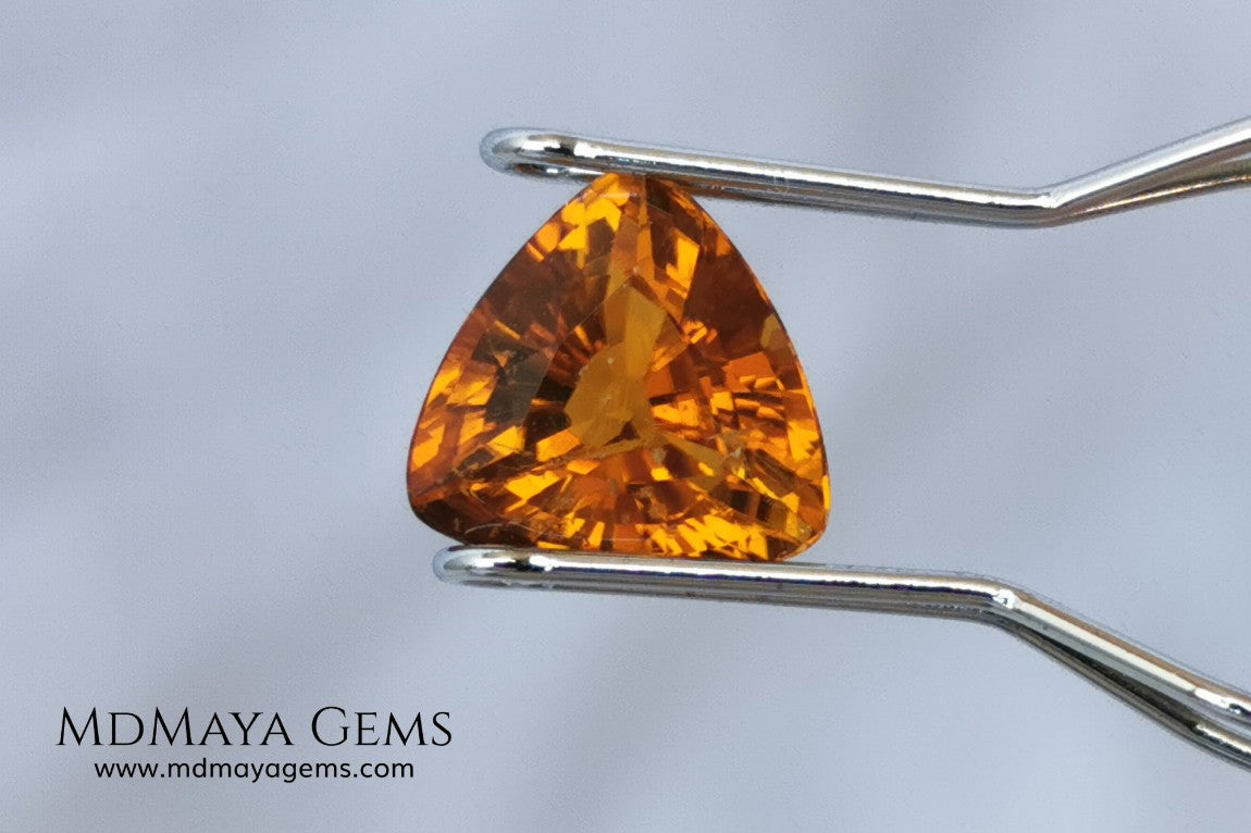 Natural Orange Tourmaline from Tanzania. 1.35 ct. Trillion cut. Rare gemstone with a beautiful honey color. It will look perfect in any piece of jewelry. 