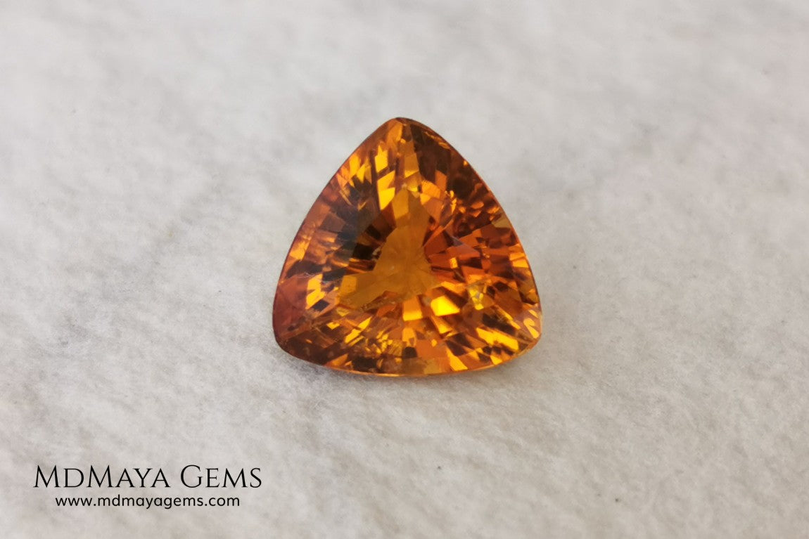 Natural Orange Tourmaline from Tanzania. 1.35 ct. Trillion cut. Rare gemstone with a beautiful honey color. It will look perfect in any piece of jewelry. 