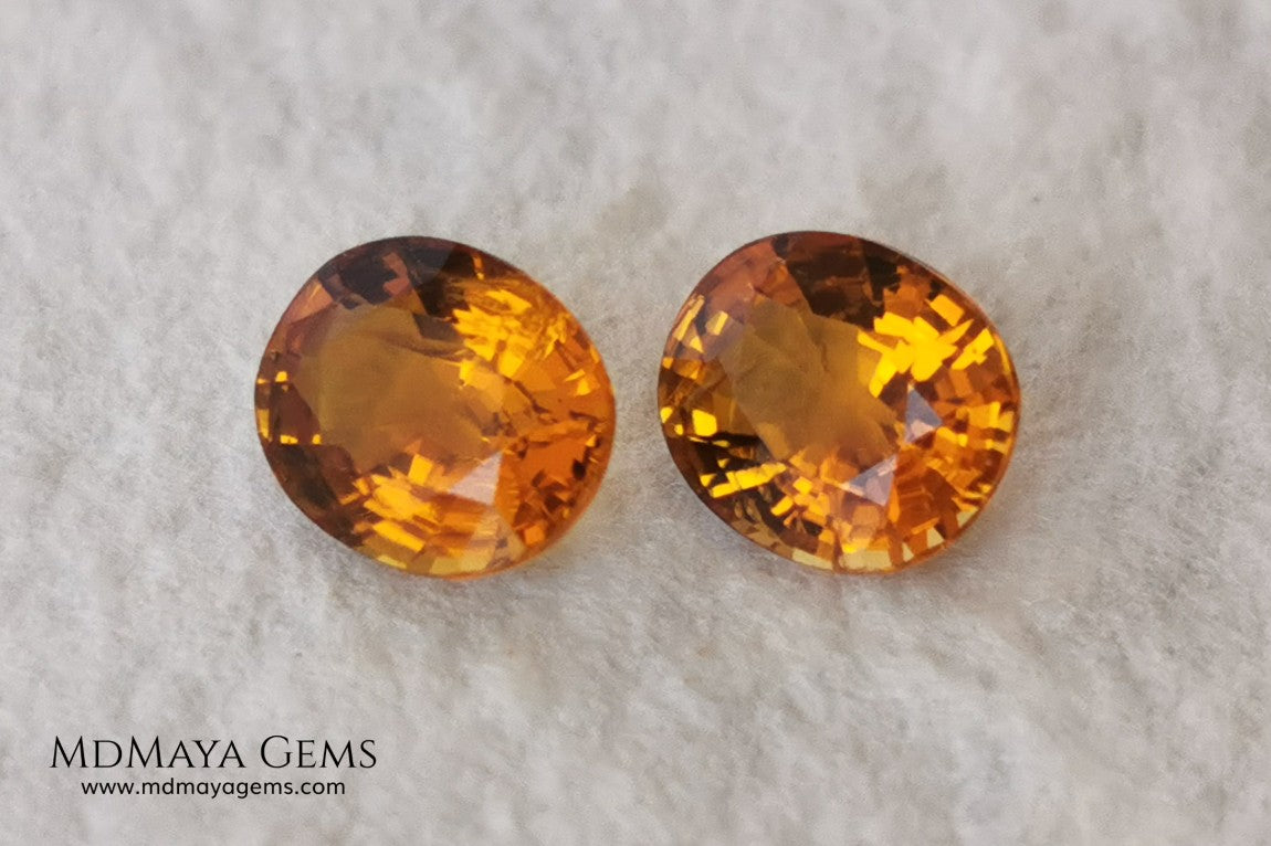 Orange Tourmaline Pair 1.46 ct. Oval Cut. Rare gemstones with a beautiful honey color. There are not many orange gems, although it is the favorite color of many people and these look impressive mounted in jewelry. Natural and untreated precious stones at an affordable price.